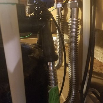 LA Water Solutions - Close-up showing flex connectors and elbows. - Water Purification Services Near Me - Sylmar, California LA Water Solutions - Close-up showing flex connectors and elbows. - Water Purification Services Near Me - Sylmar, California