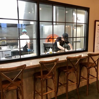 Red Or White - Birmingham - Window in the wine shop that overlooks the chefs - Wine Bars Near Me - Birmingham, Alabama Red Or White - Birmingham - Window in the wine shop that overlooks the chefs - Wine Bars Near Me - Birmingham, Alabama