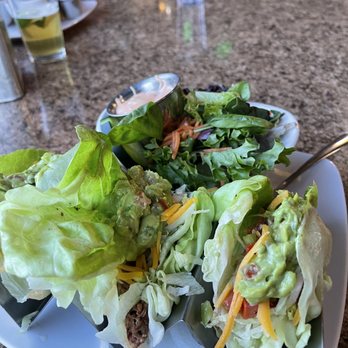 Boathouse Cantina - Carne asada tacos in lettuce wraps with side salad. - Burgers Near Me - Salida, Colorado Boathouse Cantina - Carne asada tacos in lettuce wraps with side salad. - Burgers Near Me - Salida, Colorado
