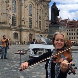 Kathy Sierra Music Studio - Dresden, GER, playing in the city square on my 1911 Dresden-made Maggini.