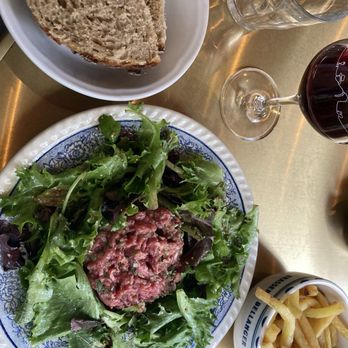 Brasserie Bellanger - Beef tartare: 15€, glass of red wine 7€, great breads - French Near Me - Paris, 01
