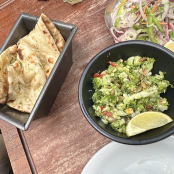 Dishoom - Naan and some broccoli dish - Indian Near Me - London, XGL Dishoom - Naan and some broccoli dish - Indian Near Me - London, XGL