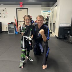 Karate America Pembroke Lakes - Rebecca earning her first stripe. Yay!