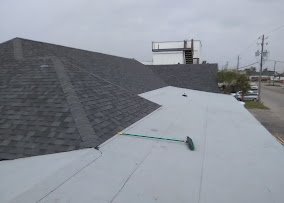 Slide of Lion Roofing