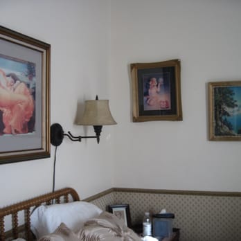 Red Garter Inn - some art in the madam's room (with my water bottle) - Hotels Near Me - Williams, Arizona