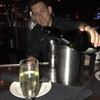 Yard House - Sam our awesome bartender pouring me up a glass of Riondo, Prosecco, Veneto - Bars Near Me - Hallandale Beach, Florida Yard House - Sam our awesome bartender pouring me up a glass of Riondo, Prosecco, Veneto - Bars Near Me - Hallandale Beach, Florida