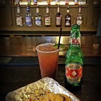 Ironwood Bar - a plate of food and a drink - Bars Near Me - Sabinal, Texas