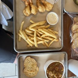 Cace's Kitchen - Shrimp in shorts with fries and a cup of crawfish étouffée.