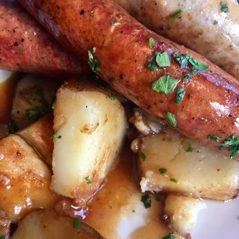 Cafe Berlin - Wurstfeast, which includes bratwurst, bauernwurst, debriziner, knackwurst, nürnberger, and choice of two sides. - German Near Me - Washington, DC, District of Columbia
