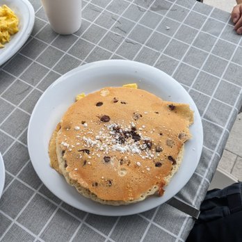 Lu Lu B's - a plate of pancakes and a cup of coffee - Breakfast & Brunch Near Me - Naples, Florida