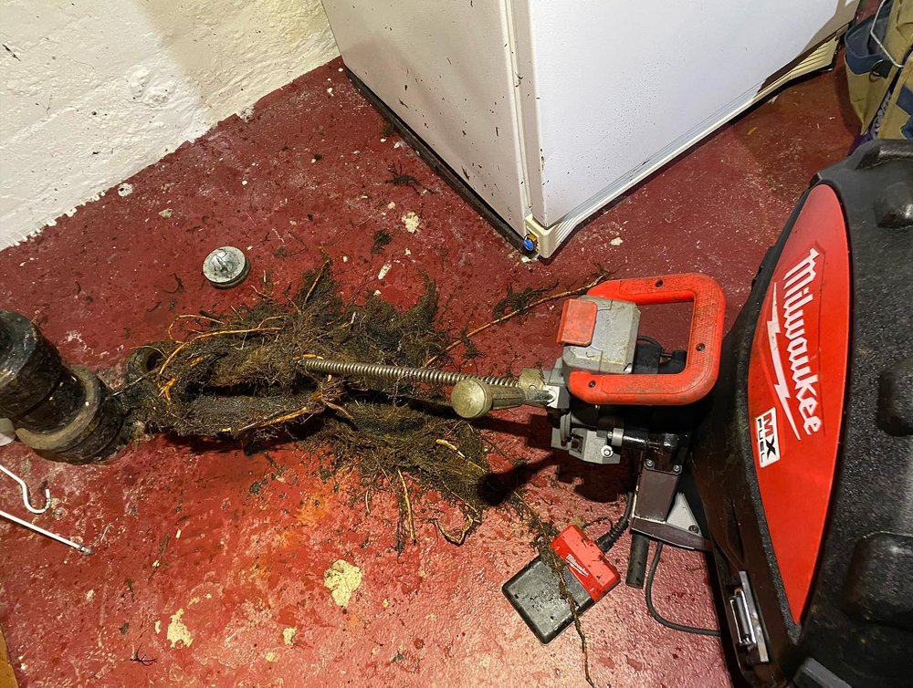 Slide of The Sewer Guys