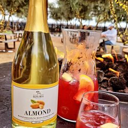 Queen Creek Olive Mill - Sangria and almond sparkling wine to go