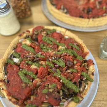 The Shop - Close up my Veggie Pesto Deep Dish Pizza - Pizza Near Me - San Diego, California The Shop - Close up my Veggie Pesto Deep Dish Pizza - Pizza Near Me - San Diego, California