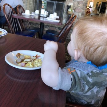 Log Cabin Restaurant - Logan enjoying his pancake. - Diners Near Me - Schofield, Wisconsin Log Cabin Restaurant - Logan enjoying his pancake. - Diners Near Me - Schofield, Wisconsin