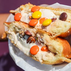 ZZ's Ice Cream Puffs - Butter Pecan ice cream with reeses pieces candy topping stuffed between a warm glazed bun