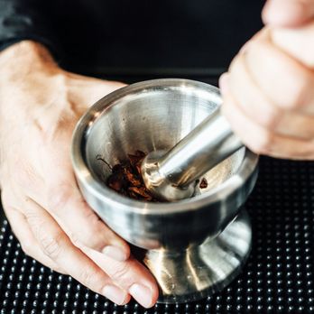Plentea Tea Bar - a person using a grinder - Coffee & Tea Near Me - Montreal, Quebec Plentea Tea Bar - a person using a grinder - Coffee & Tea Near Me - Montreal, Quebec