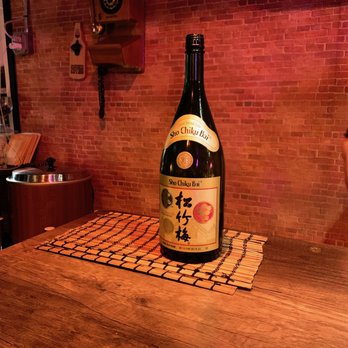 Sushi On Me - Sake flows freely all through the meal, the chefs just keep topping up your shot glass :) - Japanese Near Me - Jackson Heights, New York