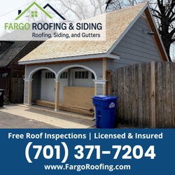 Fargo Roofing & Siding - Fargo Roofing & Siding residential project featuring a cedar shake roof installation in progress on a detached garage.