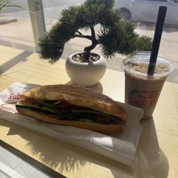 Pork belly banh mi and iced coffee combo Pork belly banh mi and iced coffee combo