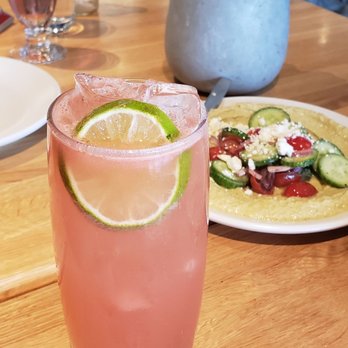 True Food Kitchen - Watermelon cocktail. Hummus in the back. - Vegetarian Near Me - Pasadena, California True Food Kitchen - Watermelon cocktail. Hummus in the back. - Vegetarian Near Me - Pasadena, California