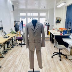Noori Stitch - Hem pants and shorten jacket hem on this Gucci suit