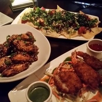 Yard House - clockwise from top: tuna poké nacho (excellent), coconut shrimp (fail), traditional firecracker wings (average). - Bars Near Me - Dedham, Massachusetts Yard House - clockwise from top: tuna poké nacho (excellent), coconut shrimp (fail), traditional firecracker wings (average). - Bars Near Me - Dedham, Massachusetts