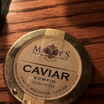 Prohibition - Lid of caviar jar - Cocktail Bars Near Me - Charleston, South Carolina Prohibition - Lid of caviar jar - Cocktail Bars Near Me - Charleston, South Carolina
