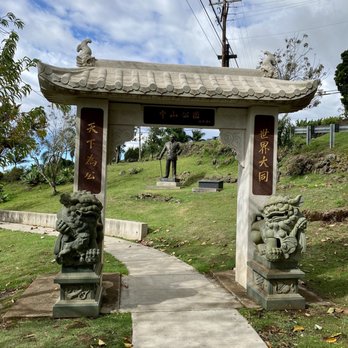 Sun Yat Sen Park - 09.10.22 statue of Sun Mei, brother of Sun Yat Sen, seen through the arch. The park was dedicated on Nov 12. 1989 - Parks Near Me - Kula, Hawaii
