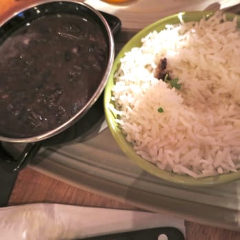 Made In Brasil Boteco - Feijoada, slow cooked mixed pork meat and black beans stew with rice - Cocktail Bars Near Me - London, XGL Made In Brasil Boteco - Feijoada, slow cooked mixed pork meat and black beans stew with rice - Cocktail Bars Near Me - London, XGL