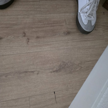 Divinity Renovations - Marks on floor, too many to show - Flooring Near Me
