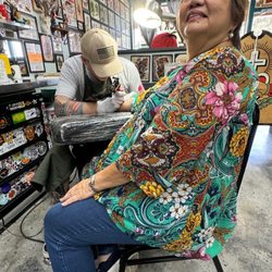 Black Palm Tattoo - My mom getting her first tattoo