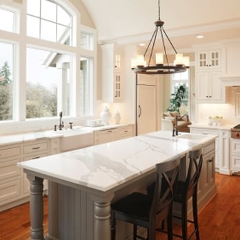 Delaney Kitchen & Design - a large kitchen with a large island - General Contractors Near Me Delaney Kitchen & Design - a large kitchen with a large island - General Contractors Near Me