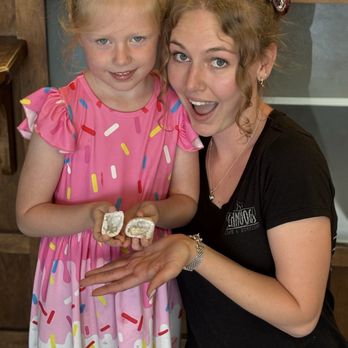 Schnoogs Cafe & Espresso - Schnoogs employee giving my daughter a geode. - Coffee & Tea Near Me - Sonora, California