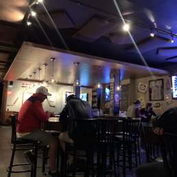 a man sitting at a bar