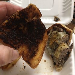Christopher's Third Street Grille - My burnt Baguette French dip sandwich roll.