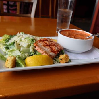 Lombardi's Italian Restaurant - Cesar Soup & Salad Combo Caesar Salad with Grilled Salmon Fillet* And Chef's Soup: tomato and mushroom - Italian Near Me - Everett, Washington
