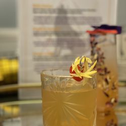 Native Cocktail Events - Check out the dried florals adorning the cocktail glass in the back!