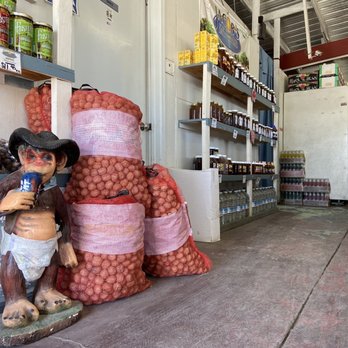 Jacob's Produce - a statue of a man holding a beer - Farmers Market Near Me - Manteca, California Jacob's Produce - a statue of a man holding a beer - Farmers Market Near Me - Manteca, California