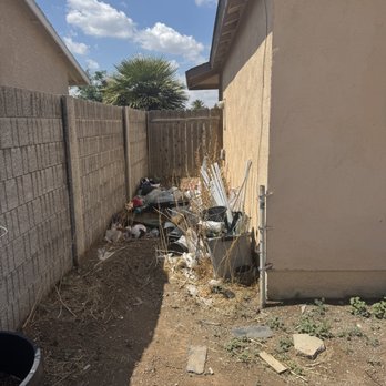 Simplicity Services - Exterior Yard Before Photo of Junk Removal Services - Office Cleaning Near Me