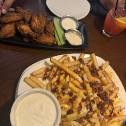 Aussie Cheese Fries and Kookaburra Wings® Aussie Cheese Fries and Kookaburra Wings®