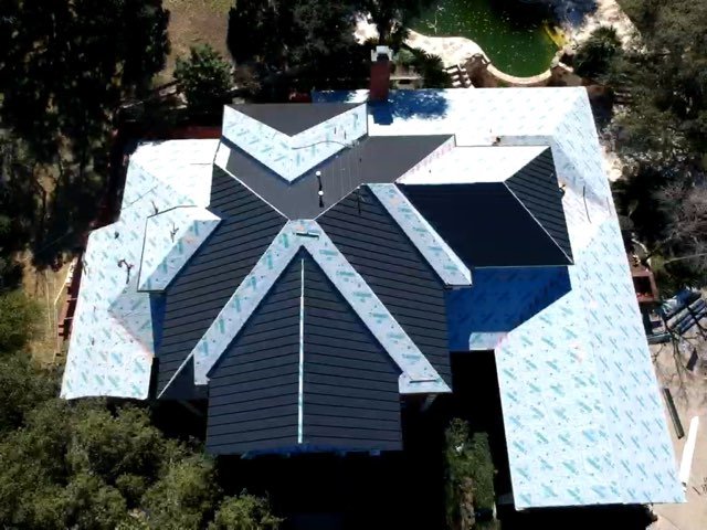 Slide of Sprauer Roofing