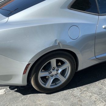 A&J Auto Body Collision - Car dent by a metal gate and scrape by the reflector - Body Shops Near Me - Perris, California