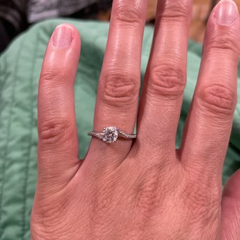 Or Diamond - My engagement ring with special (tiny) lilac sapphires on either side of the main stone (excuse my dry hand). - Jewelry Near Me - San Jose, California Or Diamond - My engagement ring with special (tiny) lilac sapphires on either side of the main stone (excuse my dry hand). - Jewelry Near Me - San Jose, California