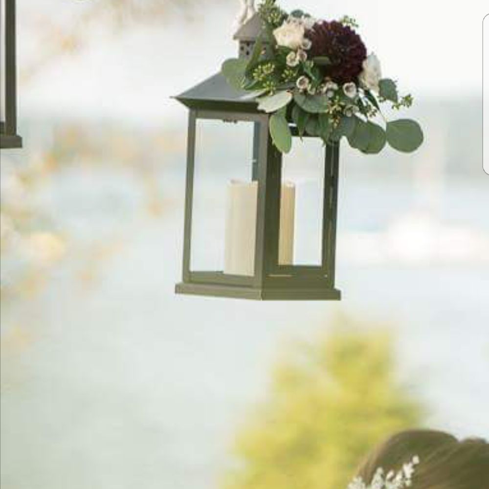 Simply Fresh Flowers - Hanging lanterns with floral arrangement made by Simply Fresh Flowers - Florists Near Me - Manlius, New York