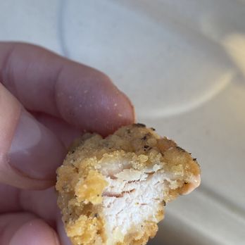 Clean Eatz - a person holding a piece of food - Gluten-Free Near Me - Orland Park, Illinois Clean Eatz - a person holding a piece of food - Gluten-Free Near Me - Orland Park, Illinois