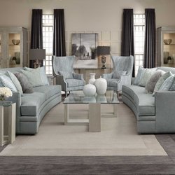 Earla's Furniture & Design Center - Pair of curved sofas available in your choice of fabrics or leather.