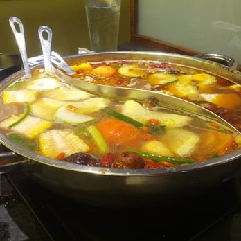 Happy Lamb Hot Pot - Half spicy, half original. Corn, egg dumplings, tomato, - Mongolian Near Me - Edison, New Jersey