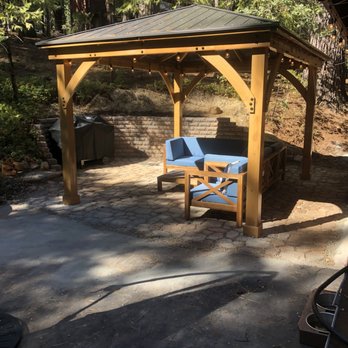 Evergreen Handyman - a patio with a gazebo - Handyman Near Me