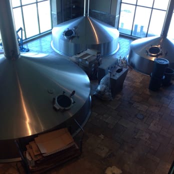 Deschutes Brewery Tasting Room - The nice (but toasty warm) view of the initial brewing room. - Breweries Near Me - Bend, Oregon