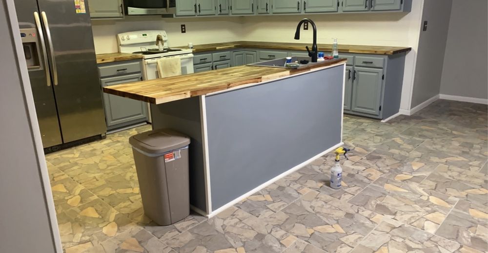 Slide of Anytime Renovation & Drain